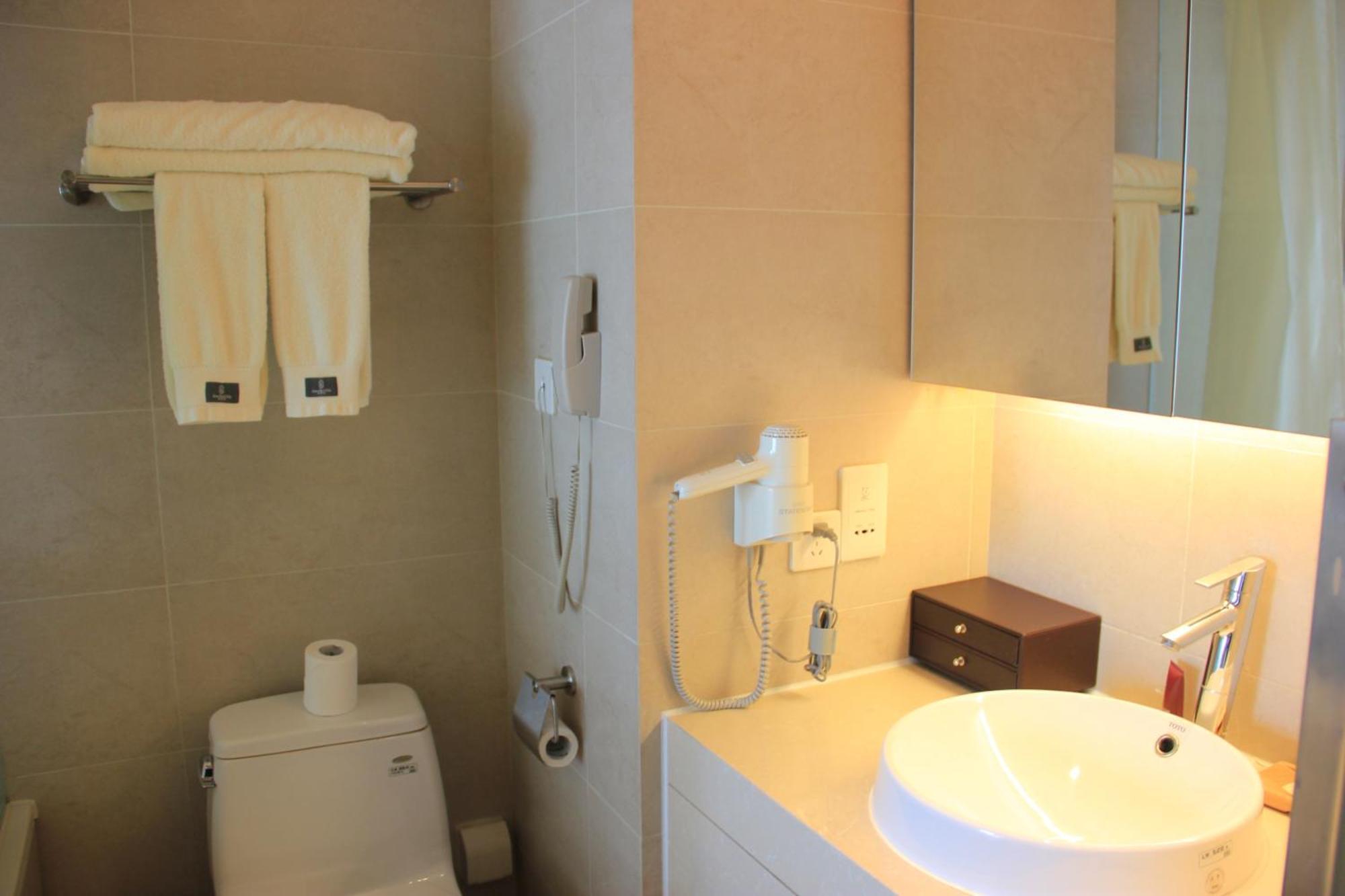 Green Park Hotel Tianjin Binhai  Habitación foto